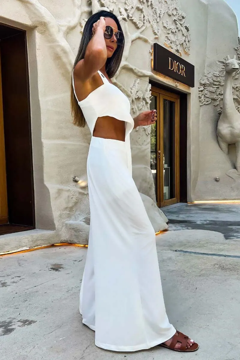 Sleeveless white summer suit